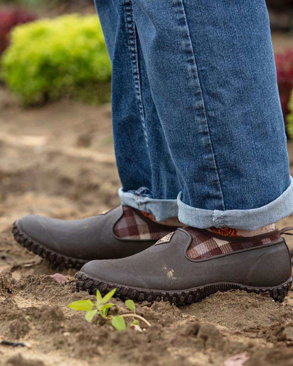 Brown Plaid Print coloured Muck Boots Womens RHS Muckster II Low Shoes on Mucky background 