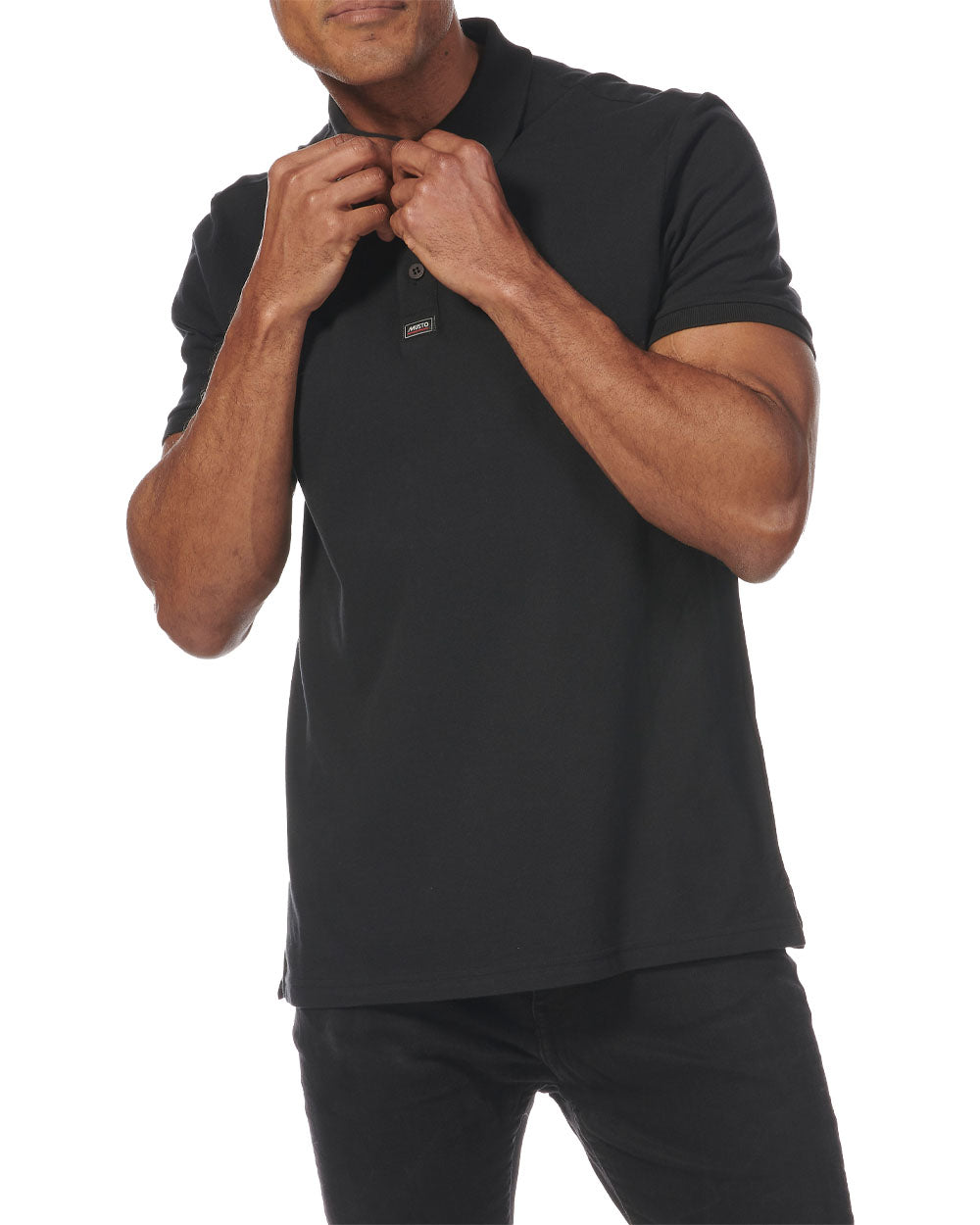 Black coloured Musto Essential Pique Polo Shirt on White background 
