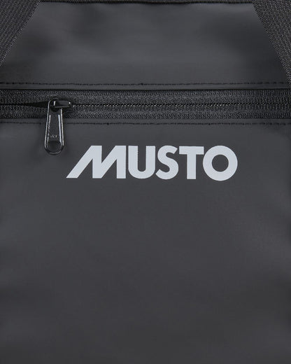 Black Coloured Musto Genoa Small Carryall on White Background
