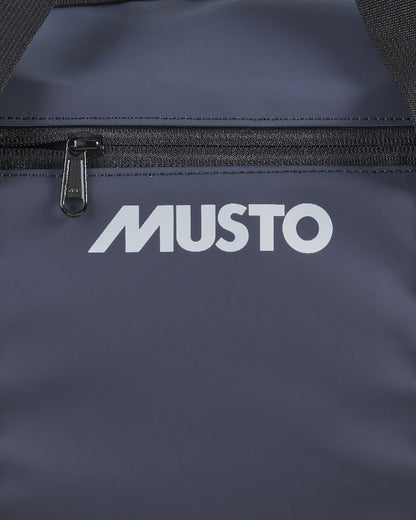 Navy Coloured Musto Genoa Small Carryall on White Background
