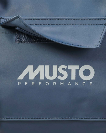 True Navy coloured Musto Genoa Small Carryall on White background 