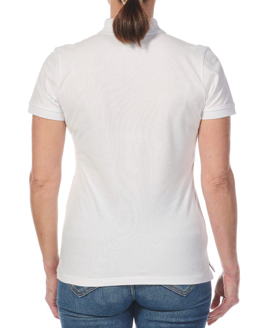White Coloured Musto Ladies Essential Pique Polo Shirt on white background 
