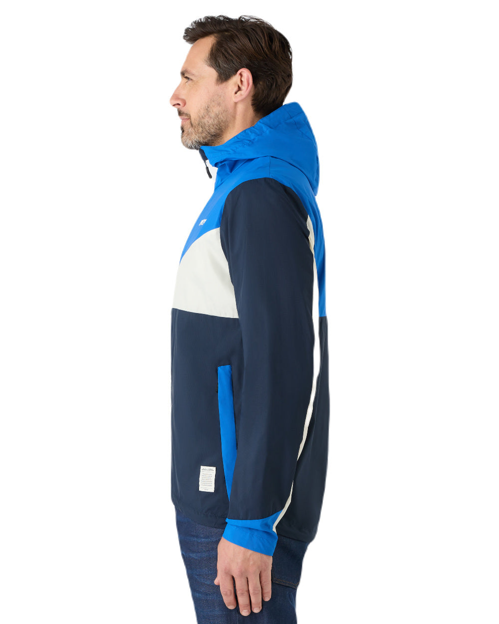 Aruba Blue/Navy Coloured Musto Mens 64 Windbreaker Jacket On A White Background 