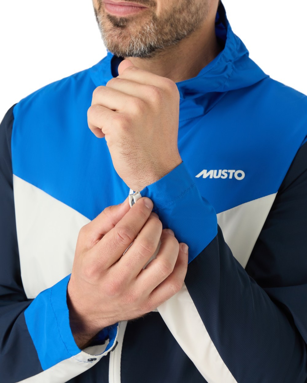 Aruba Blue/Navy Coloured Musto Mens 64 Windbreaker Jacket On A White Background 