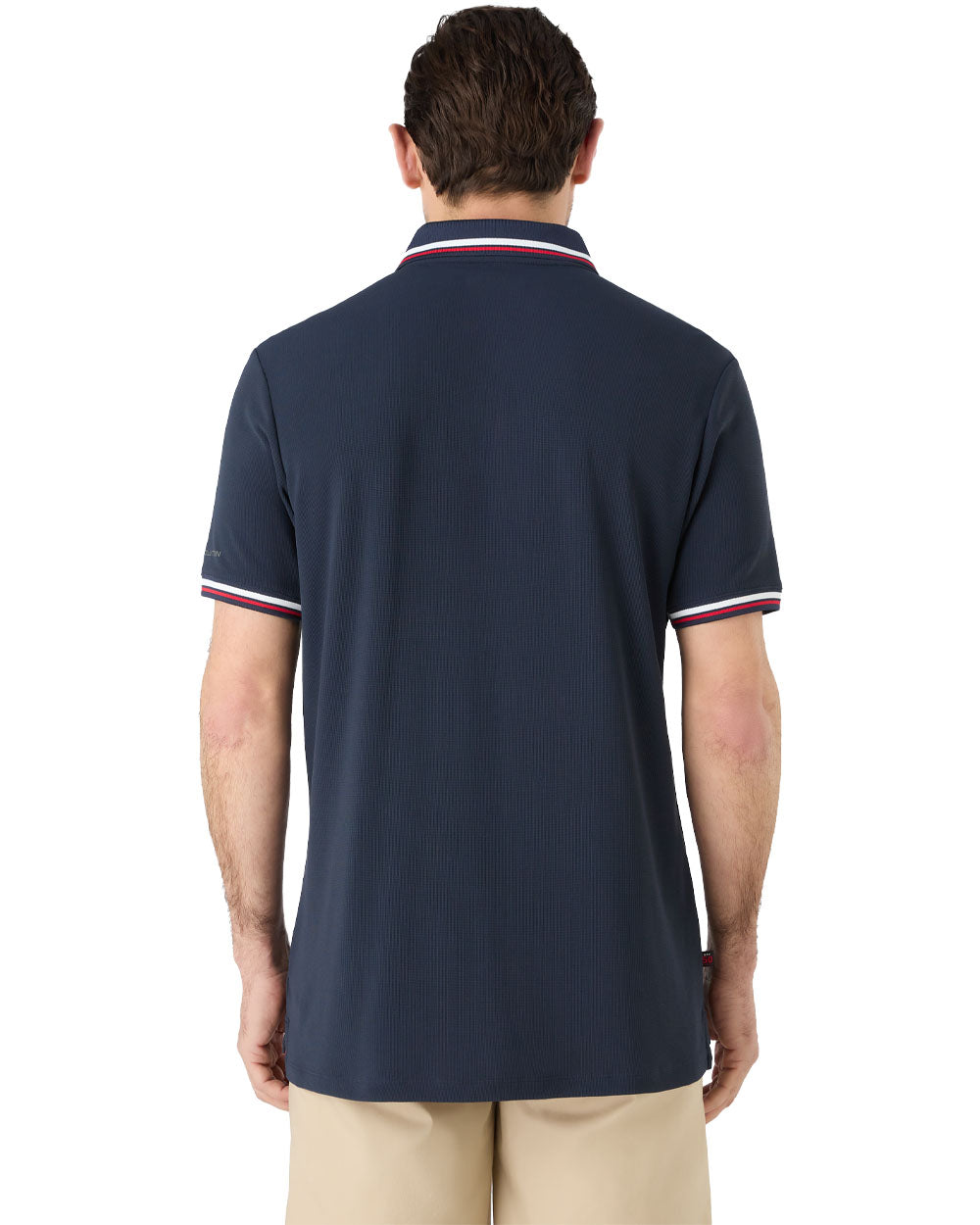 Navy coloured Musto Mens Evolution Pro Lite Short Sleeved Polo on White background 