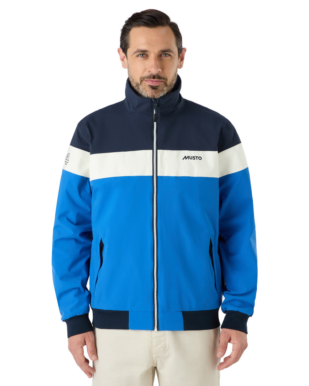 Aruba Blue/Navy/Asw Coloured Musto Mens Musto 64 Snug Blouson Jacket On A White Background 