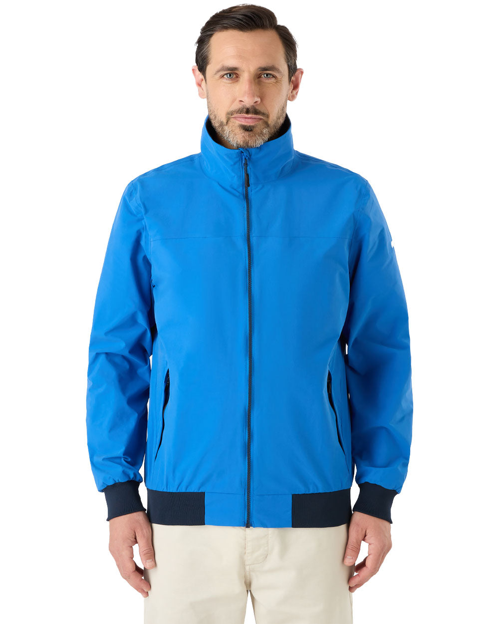 Aruba Blue coloured Musto Snug Blouson Jacket on White background 