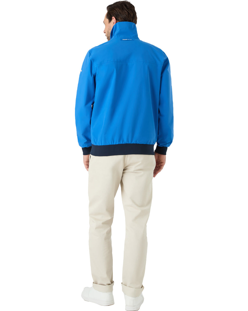 Aruba Blue coloured Musto Snug Blouson Jacket on White background 