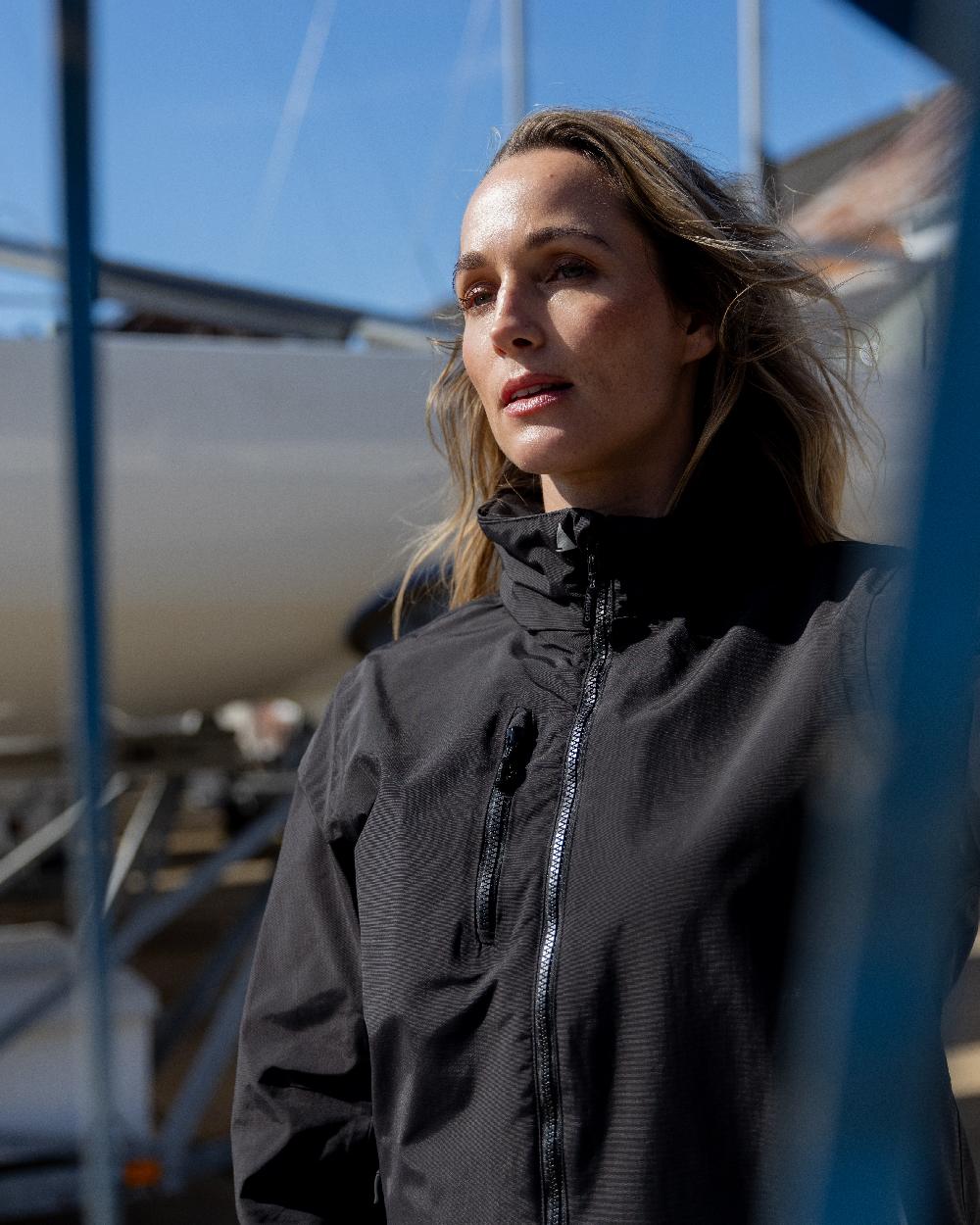Black Coloured Musto Womens Sardinia Jacket on Blurry Background
