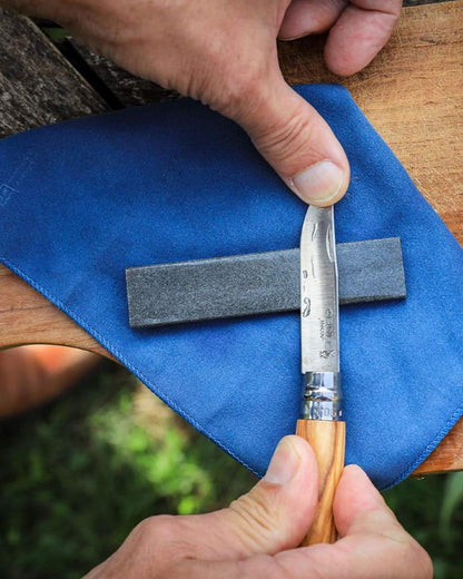 Opinel Sharpening Stone On A Forest Background