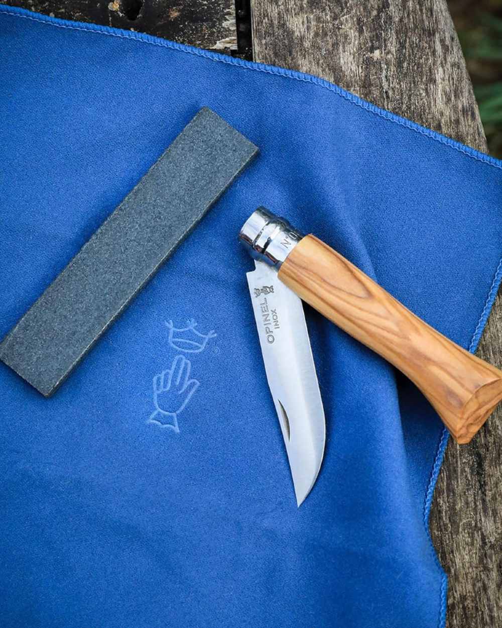 Opinel Sharpening Stone On A Forest Background