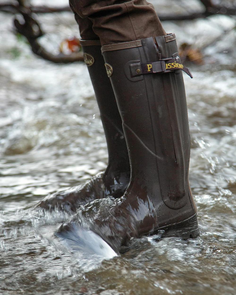 Brown Coloured Percussion Rambouillet Full Zip Boots On A Stream Background