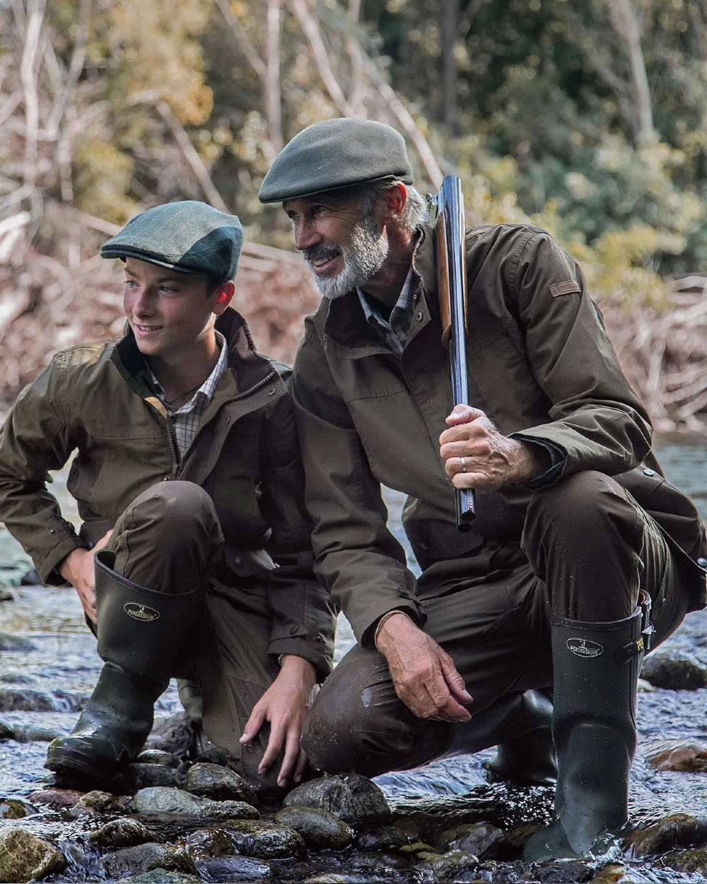 Khaki Coloured Percussion Imperlight Reinforced Trousers On A Forest Background 