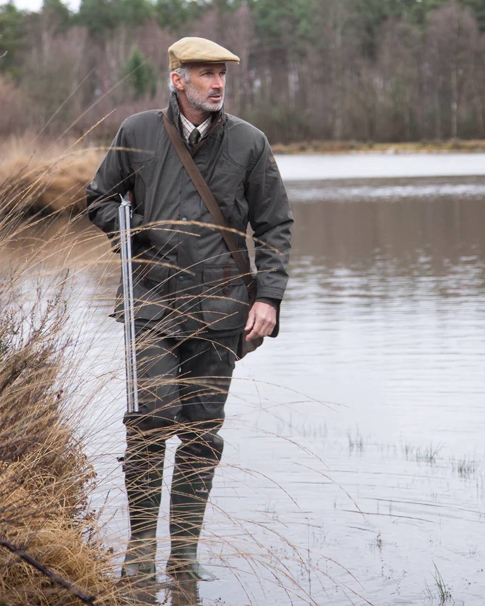 Khaki Coloured Percussion Sologne Rubber Neoprene Wellington Boots On A Forest Background