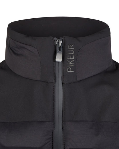 Black Coloured Pikeur Hybrid Vest On A White Background 