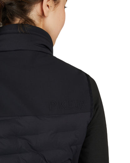 Black Coloured Pikeur Hybrid Vest On A White Background 