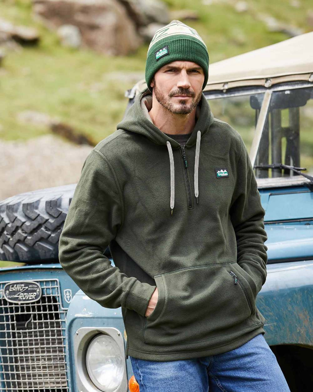 Deep Forest Coloured Ridgeline Ballistic Hooded Fleece on outdoor background 