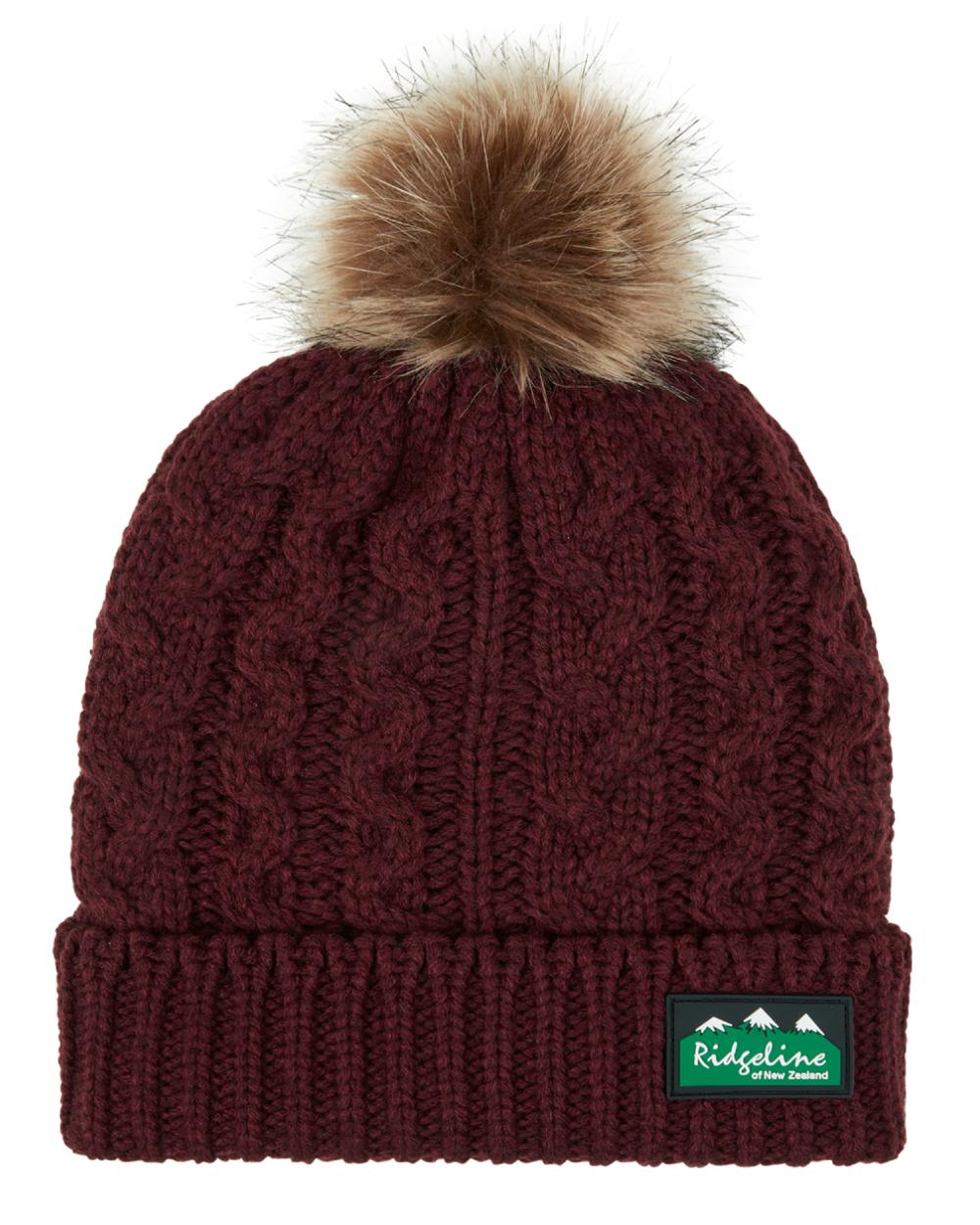 Winter Berry Coloured Ridgeline Nordic Fleck Bobble Hat on white background 