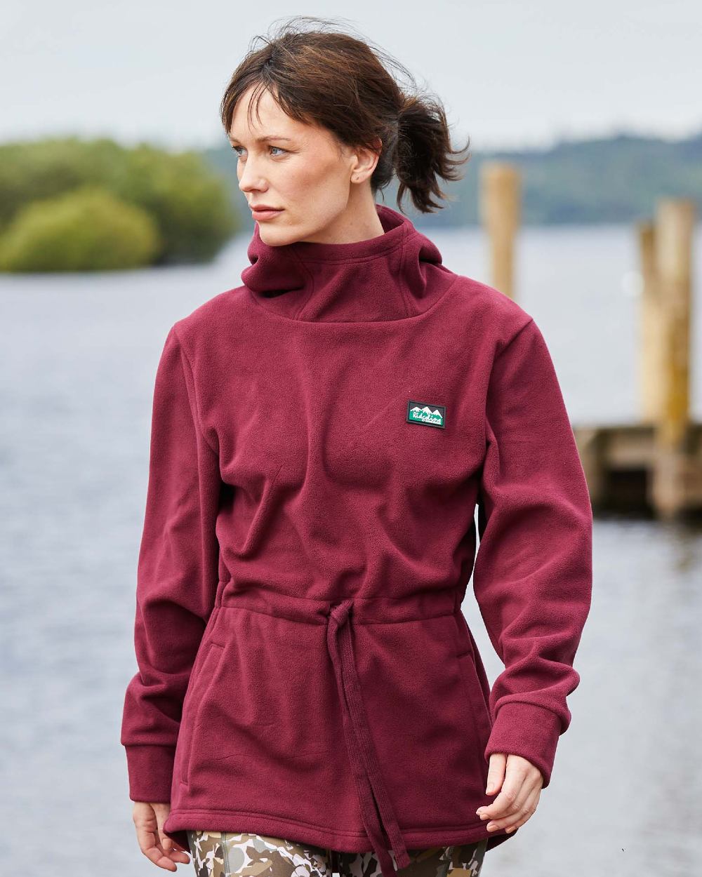 Winter Berry Coloured Ridgeline Womens Salt Marsh Fleece Smock On A River Background 