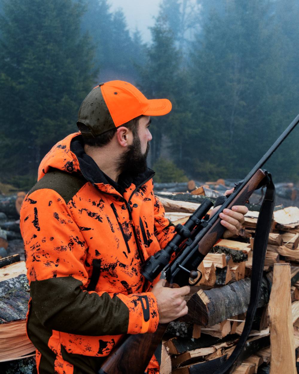 InVis Orange Blaze Coloured Seeland Helt Shield Jacket On A Forest Background