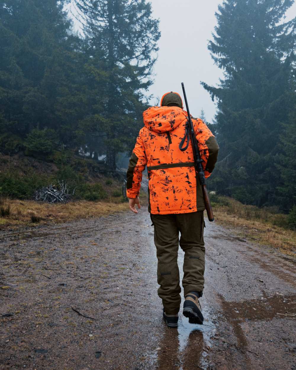 InVis Orange Blaze Coloured Seeland Helt Shield Jacket On A Forest Background