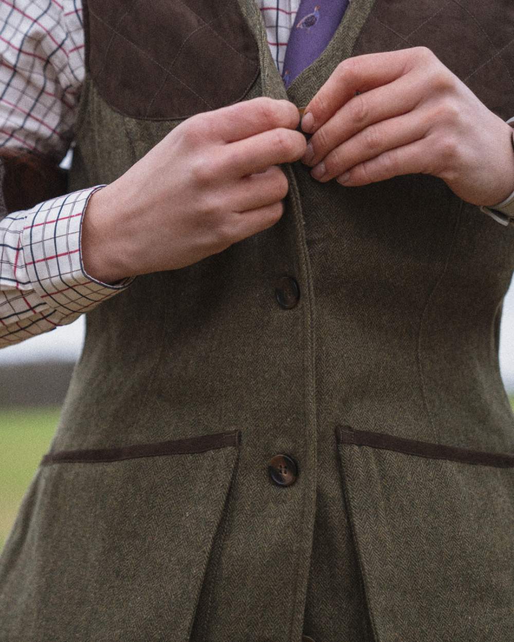 Moss Green Coloured Seeland Hillside Harriet Waistcoat On A Field Background