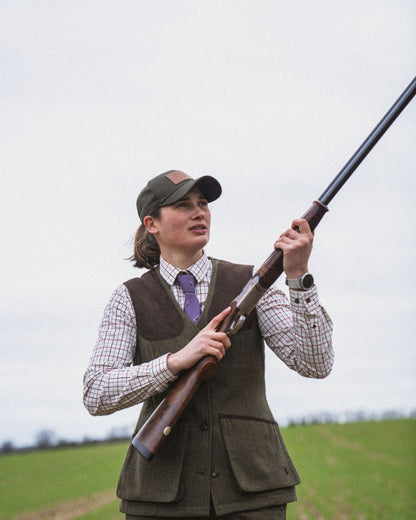 Moss Green Coloured Seeland Hillside Harriet Waistcoat On A Field Background