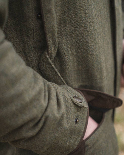 Moss Green Coloured Seeland Hillside Jacket On A Field Background