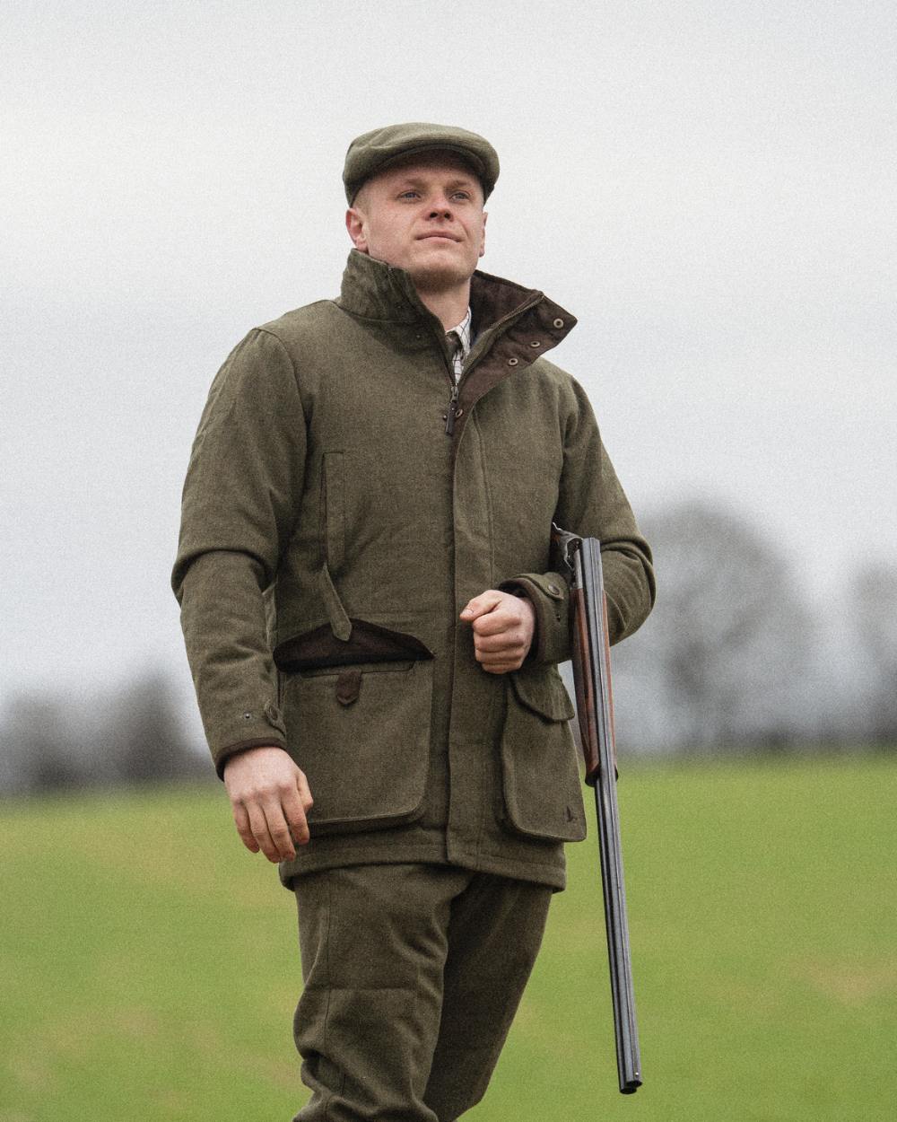 Moss Green Coloured Seeland Hillside Jacket On A Field Background