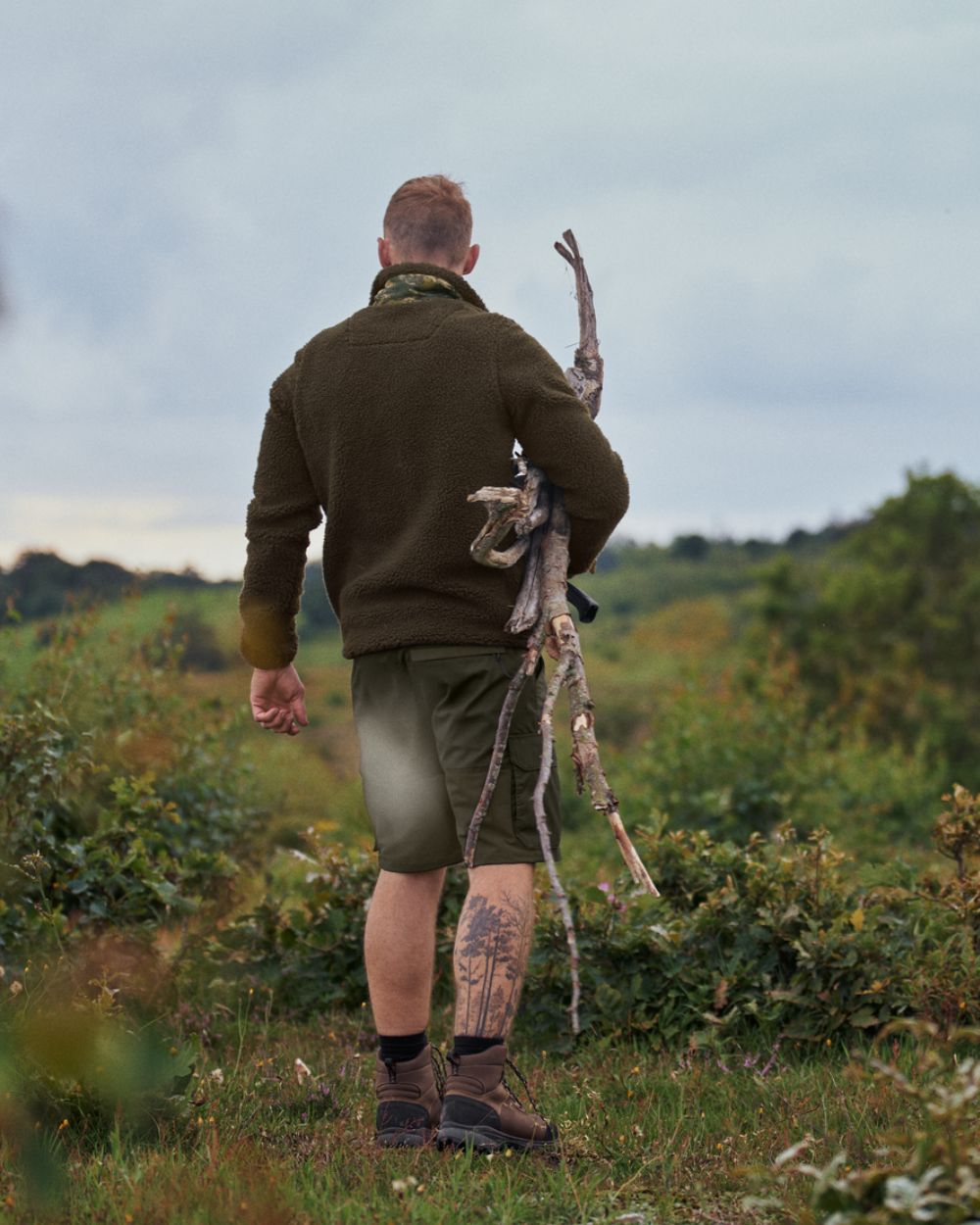 Grizzly Brown Coloured Seeland Zephyr Camo Fleece Jacket On A Forest Background