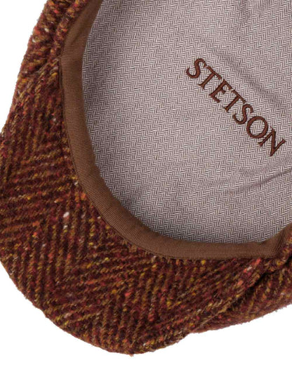 Autumn Red Coloured Stetson Hatteras Herringbone Flat Cap On A White Background 