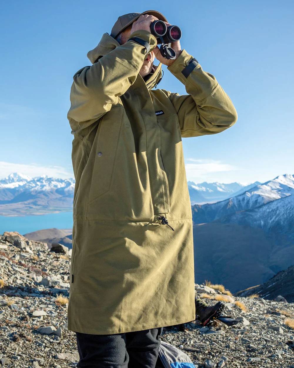 Tussock Green Coloured Swazi Tahr Xp Smock on mountain background 