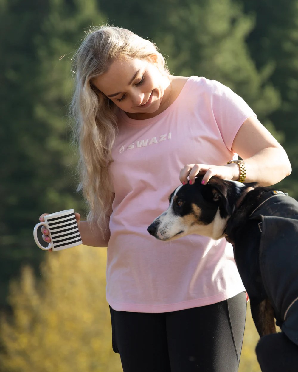 Pink Coloured Swazi Womens Cap Sleeve T-Shirt On A Forest Background 