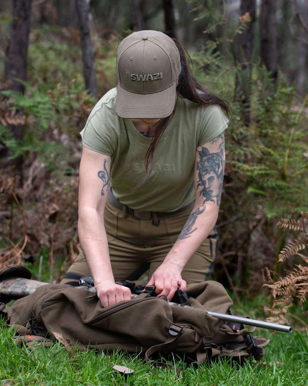 Sage Coloured Swazi Womens Cap Sleeve T-Shirt On A Forest Background 