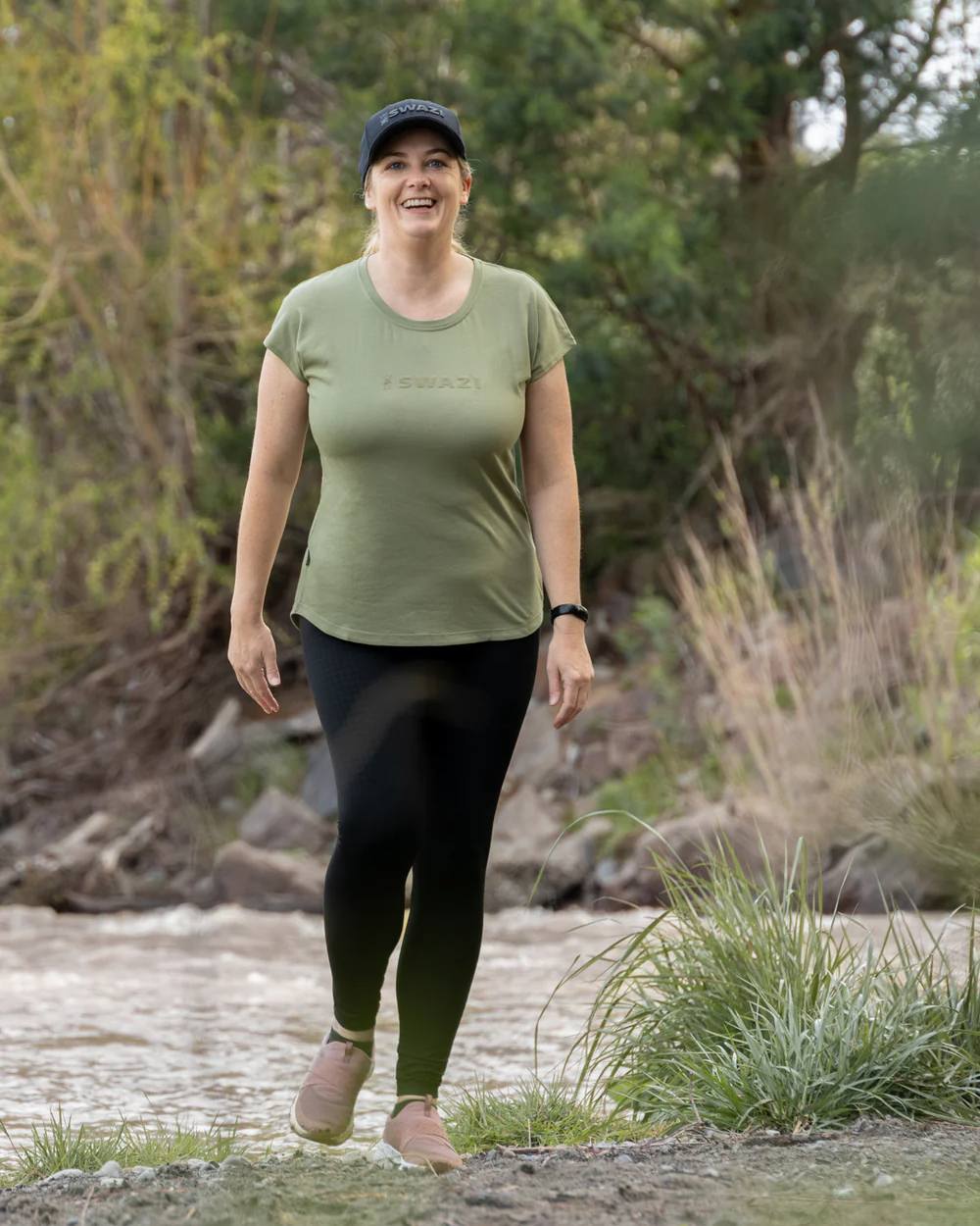 Sage Coloured Swazi Womens Cap Sleeve T-Shirt On A Forest Background 