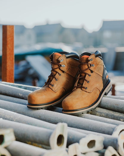 Honey coloured Timberland Pro Ballast Safety Boots on blurry background 