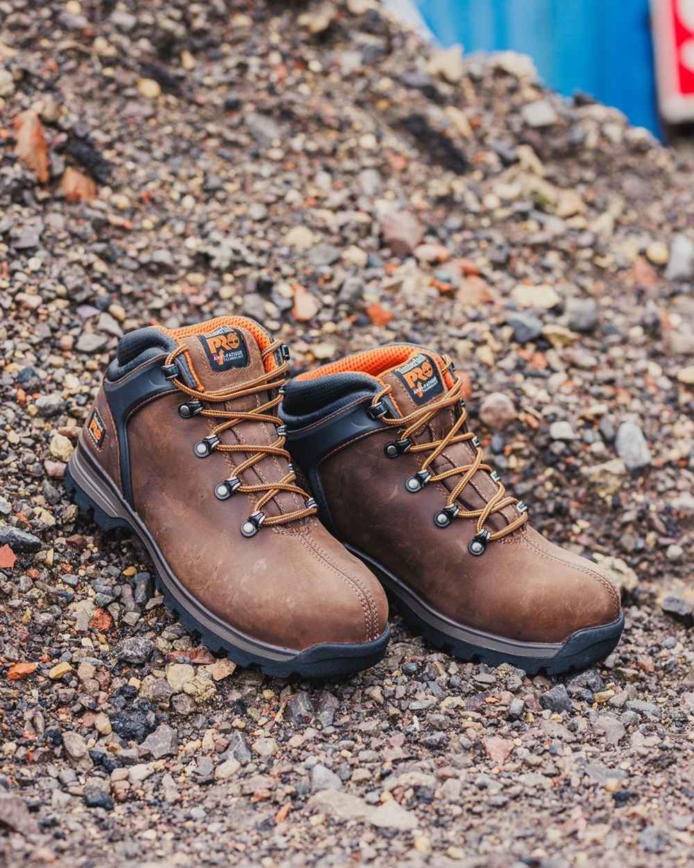 Brown coloured Timberland Pro Splitrock XT Composite Safety Toe Work Boots on construction background 