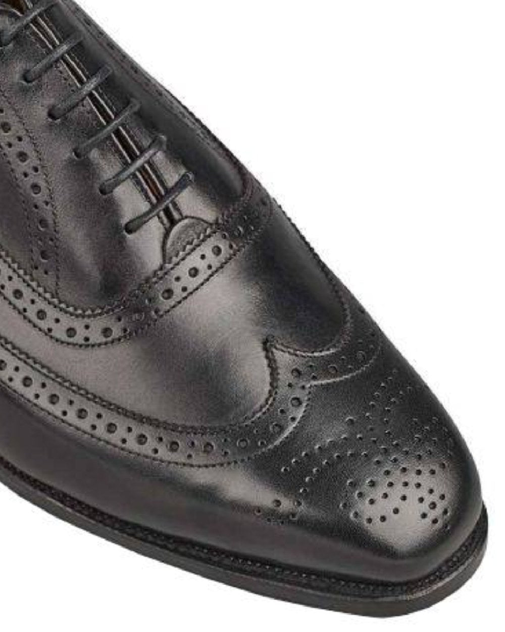 Black Coloured Trickers Picadilly Leather Sole Brogue Oxford City Shoe On A White Background 