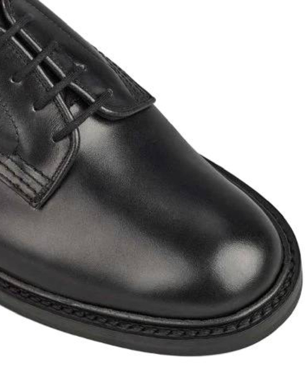 Black Calf Coloured Trickers Woodstock Plain Derby Shoe Dainite Sole On A White Background 