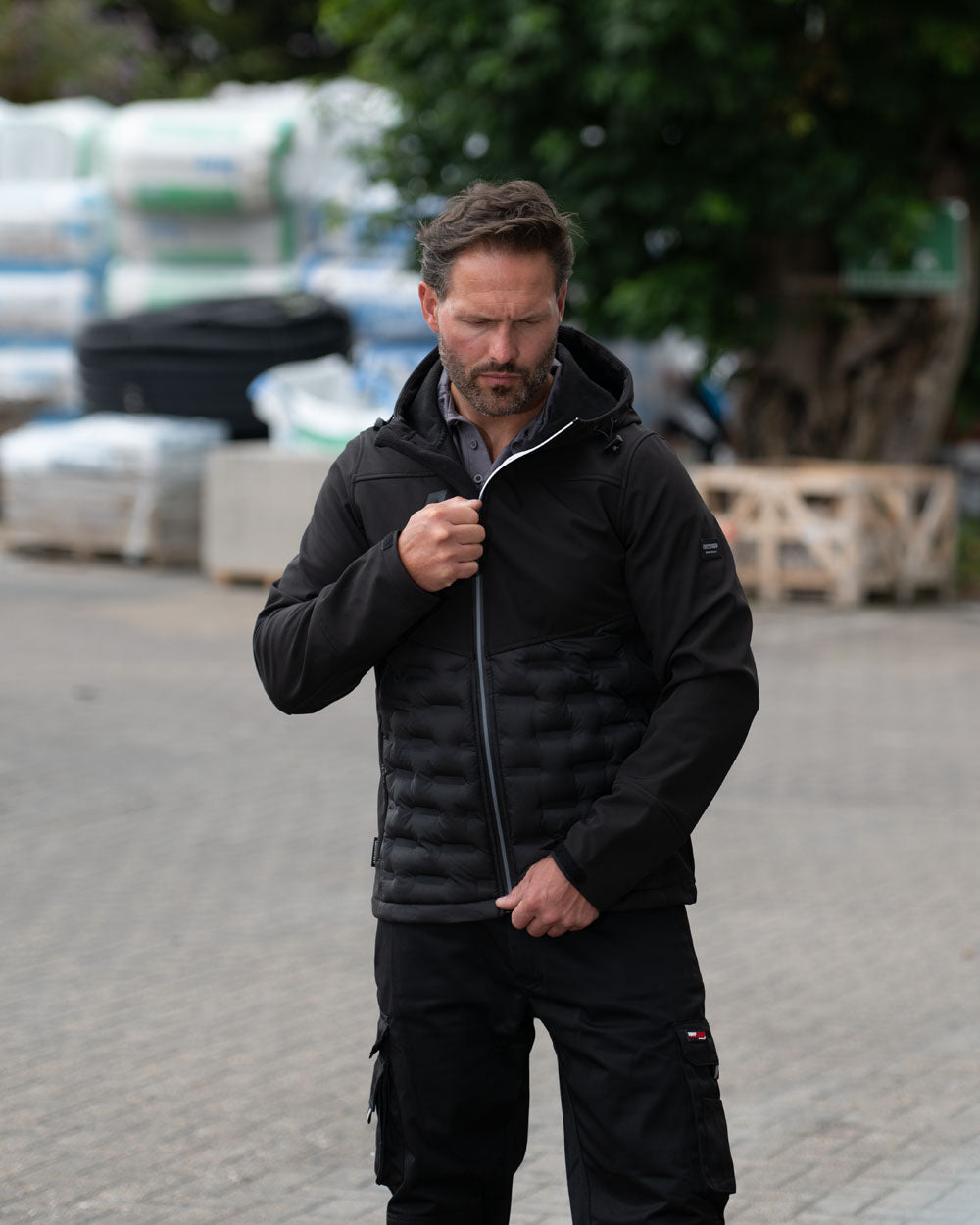 Black Coloured Tuffstuff Mens Stratford Softshell Jacket on Urban background 