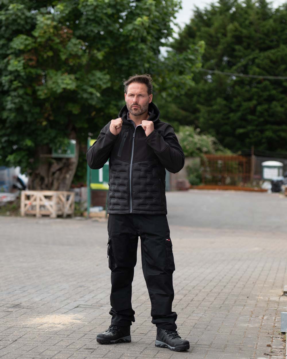 Black Coloured Tuffstuff Mens Stratford Softshell Jacket on Urban background 