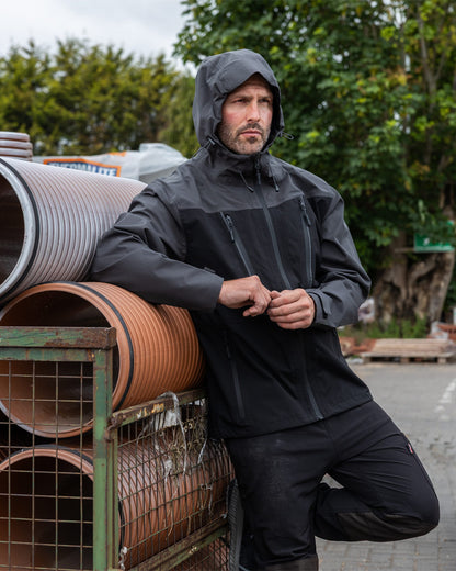 Black coloured TuffStuff ProShell Jacket on urban background 