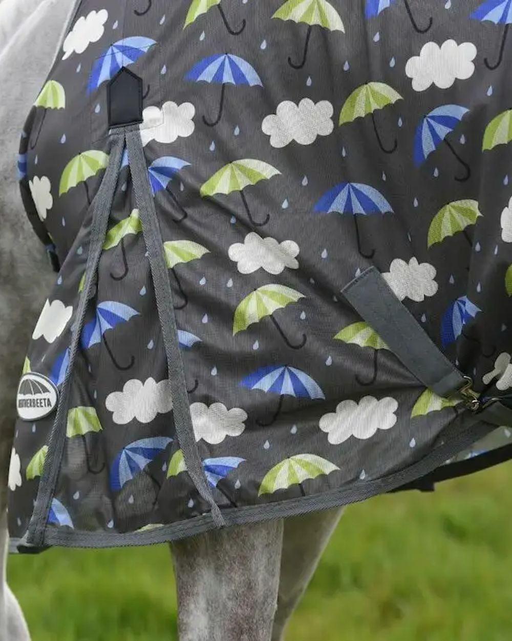 Umbrella Print coloured WeatherBeeta ComFiTec Essential Mesh II Combo Neck on green background 