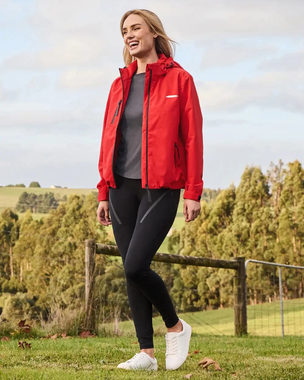 Bittersweet Coloured WeatherBeeta Jackson Waterproof Jacket On A Hill Background 