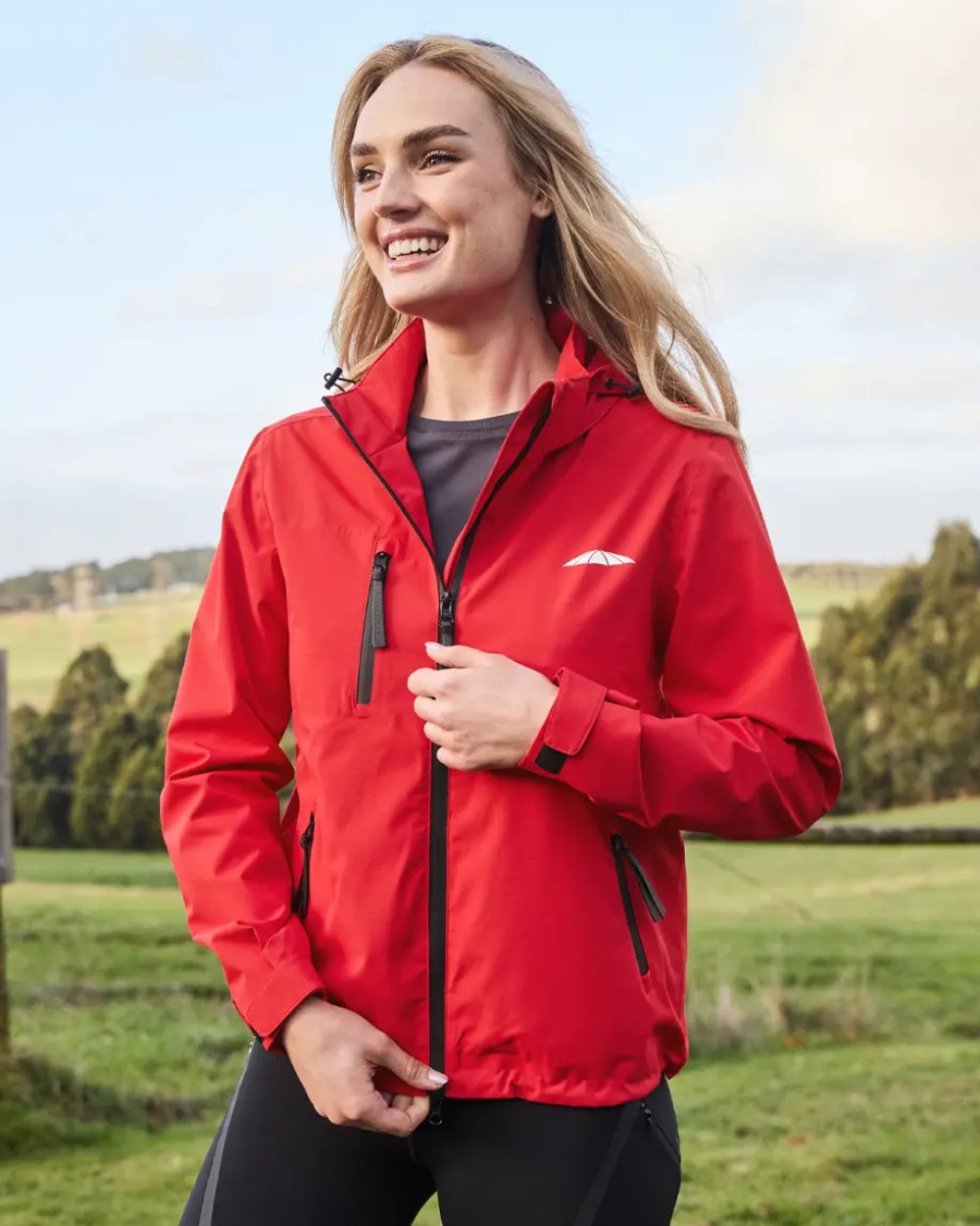 Bittersweet Coloured WeatherBeeta Jackson Waterproof Jacket On A Hill Background 