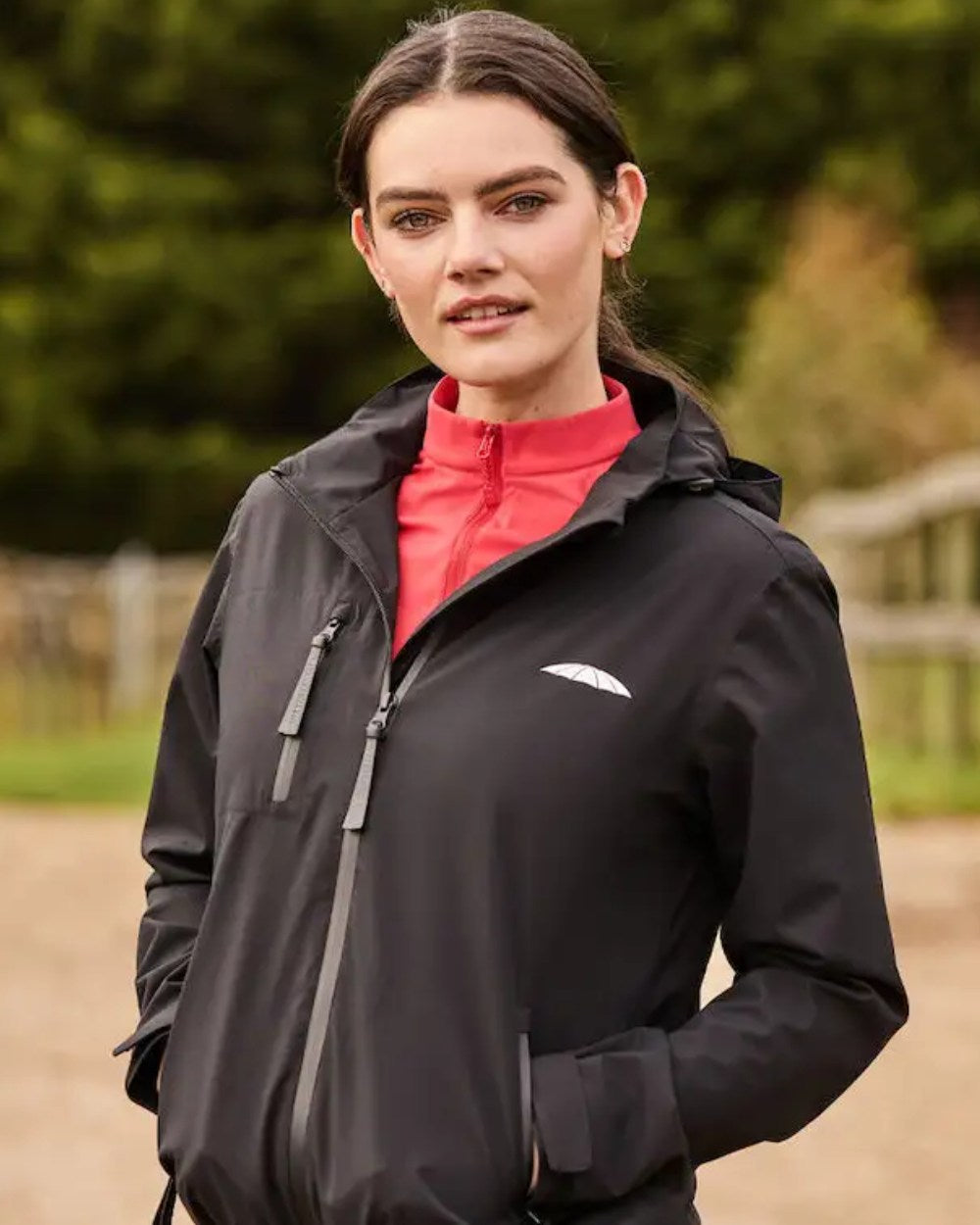 Black Coloured WeatherBeeta Jackson Waterproof Jacket On A Field Background 