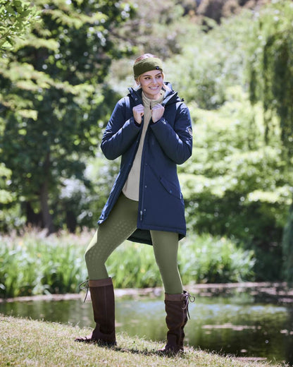 Navy Iris Coloured WeatherBeeta Kyla II Waterproof Jacket On A Forest Background 