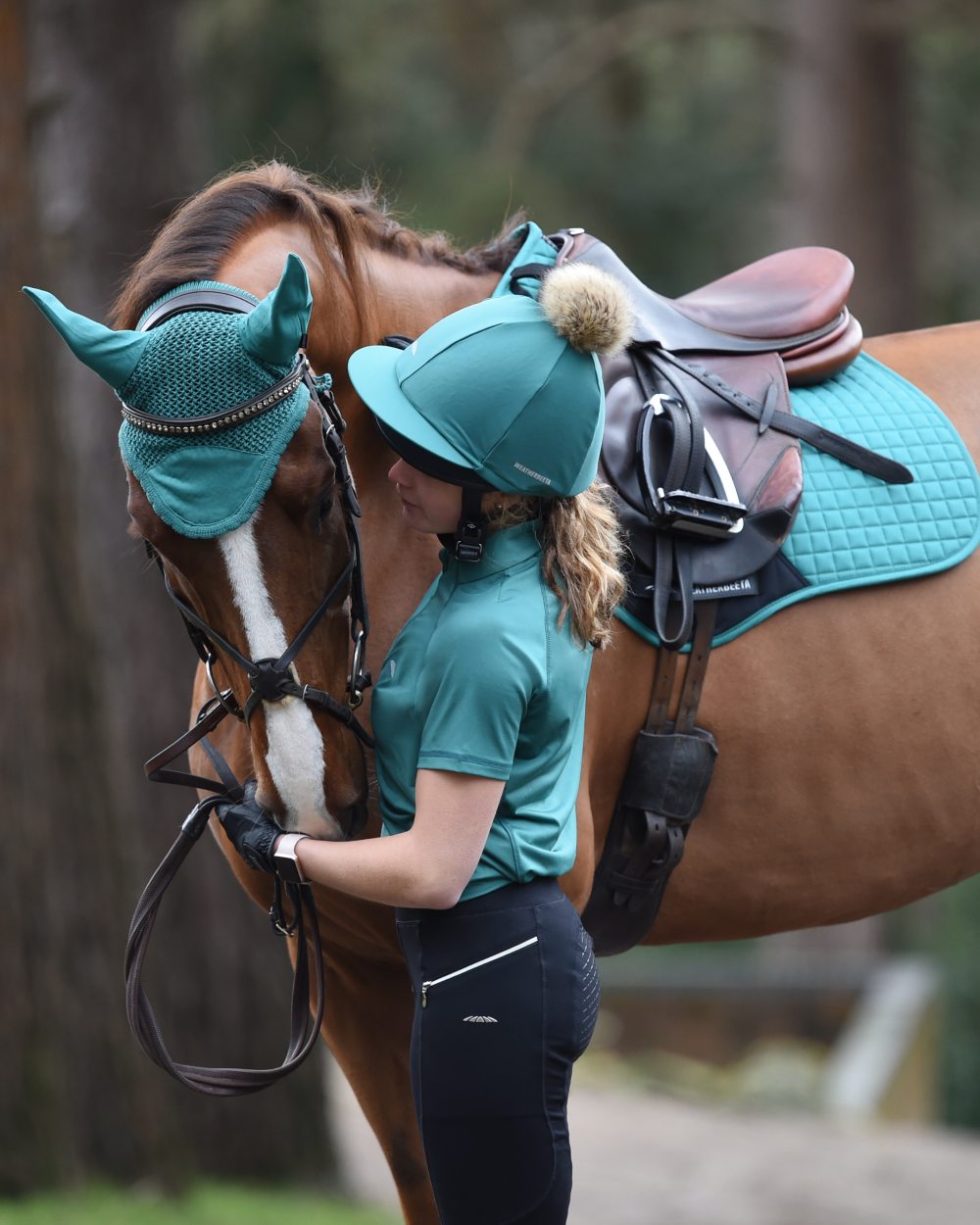 Turquoise Coloured WeatherBeeta Prime Short Sleeve Top On A Arena Background 