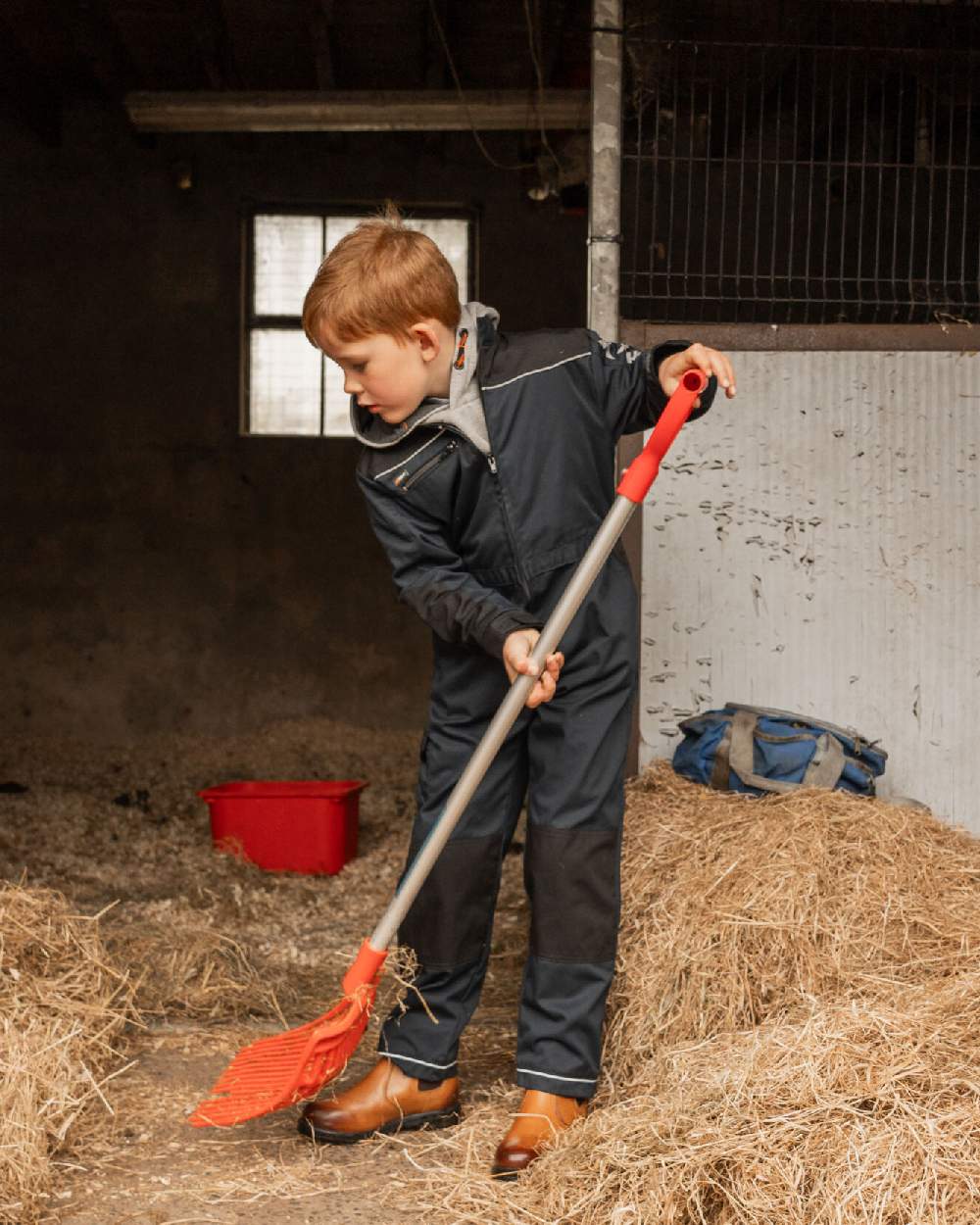 Navy Coloured Xpert Children Pro Coverall on Indoor Background
