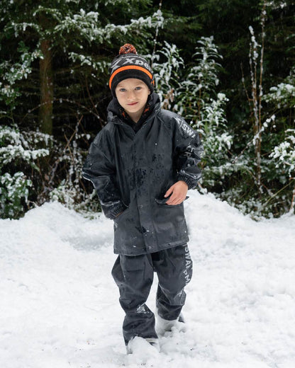 Black Coloured Xpert Kids Swampmaster Stormgear Junior Gift Bundle GGS 2024 on Snow Background
